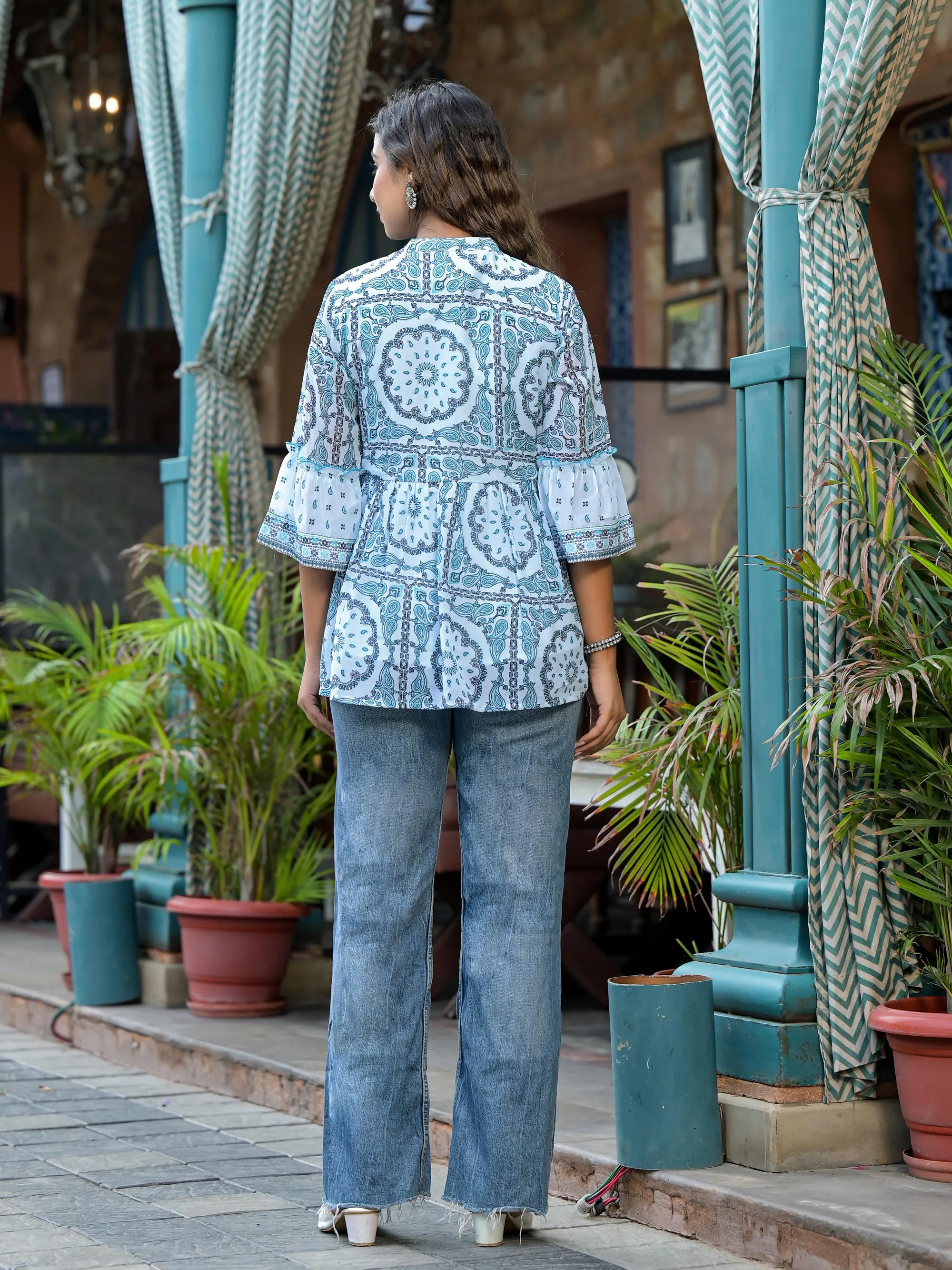 Sky Blue Ethnic Motif Printed Georgette Lacy Tunic With Tassels & Sequins